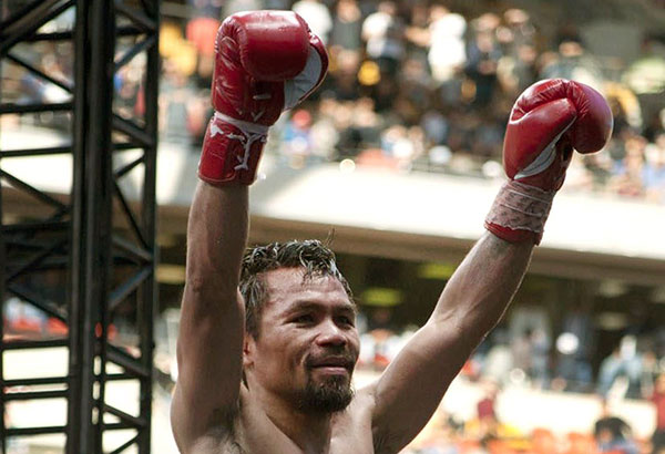 Pacquiao wins in stats, but loses on scorecards