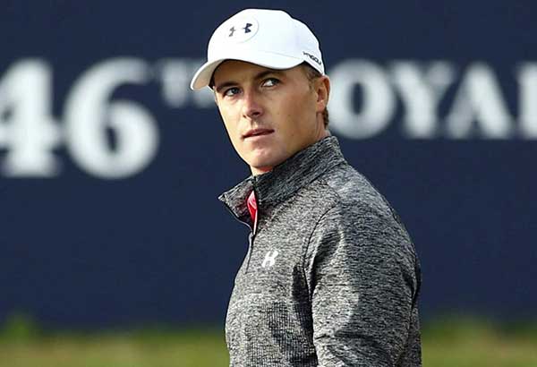 Spieth zeroes in on crown; Grace posts record Major low