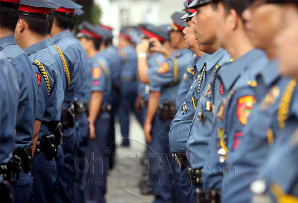 14 cops in illegal arrest, extortion deny charges