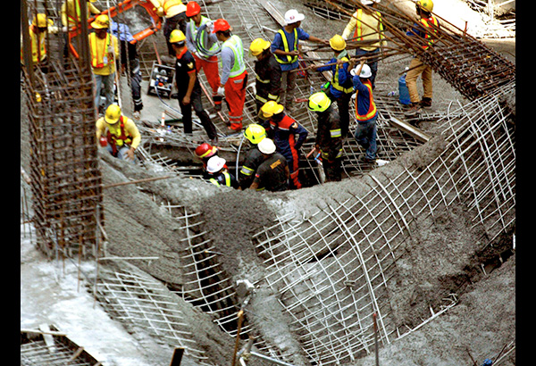 2 dead as building collapses in Taguig