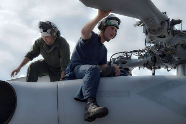 US Navy destroyer sails near reefs claimed by China
