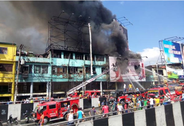 General alarm raised as fire razes Manila