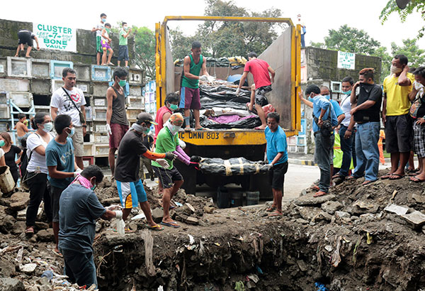 250 Unclaimed Bodies Buried In Mass Grave | Metro, News, The Philippine ...