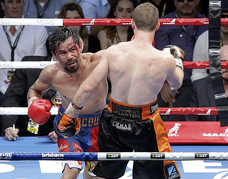 Pacquiao wins in stats, but loses on scorecards