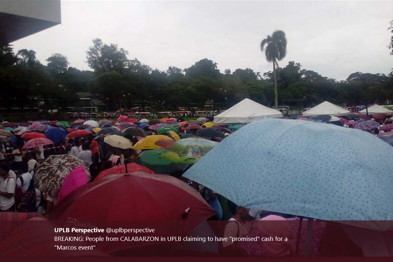 Thousands flock to UPLB in hopes of Marcos money