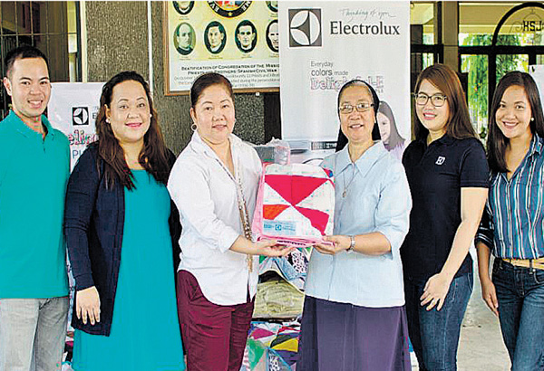 Electrolux gives warmth-giving quilts to Hospicio de San Jose children