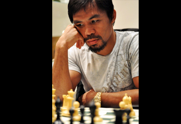 Pacquiao spends time on chess, darts