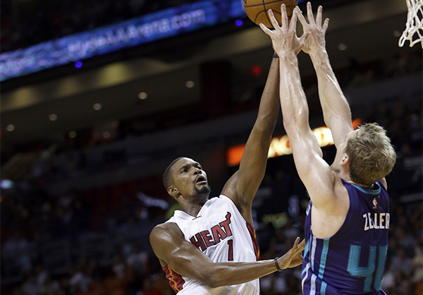 Hornets top Heat, returning Bosh