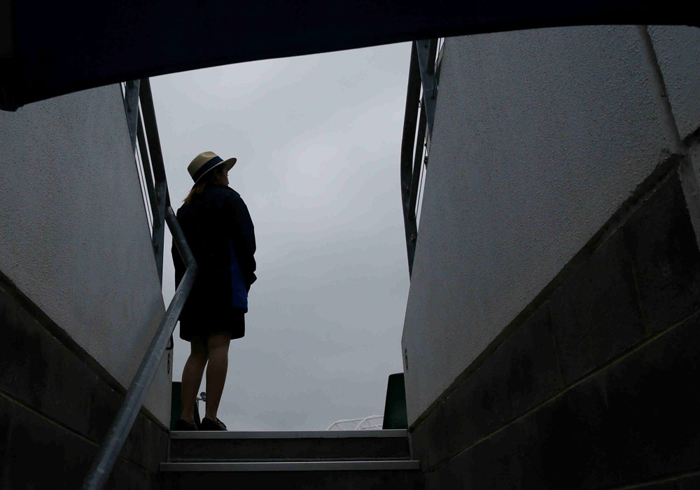 Rain delays Australian Open start on side courts