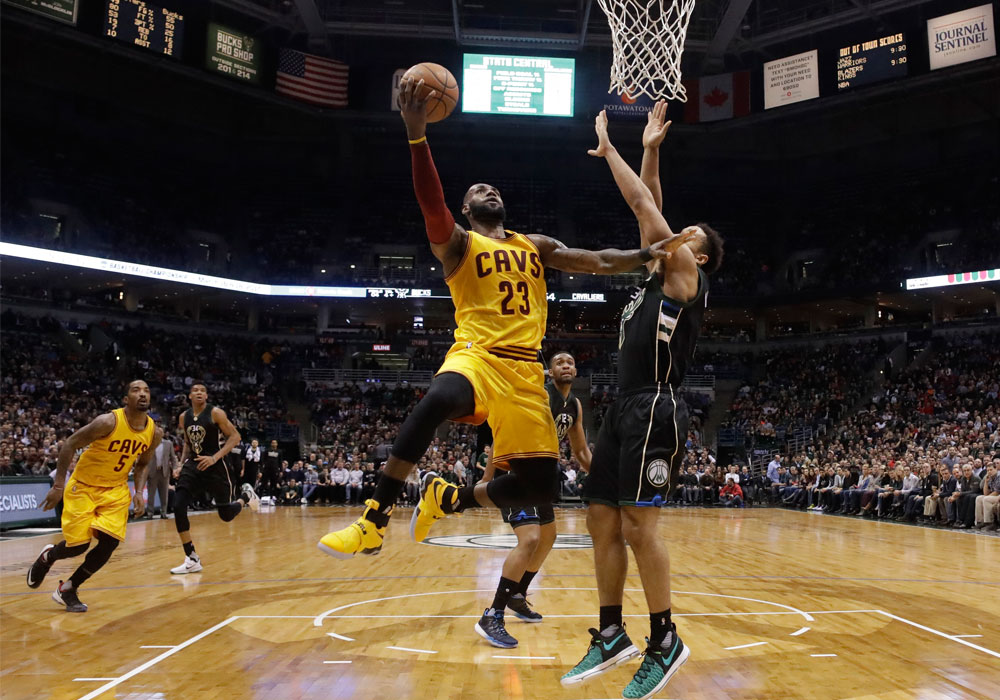 LeBron powers Cavs past Bucks in OT, 114-108