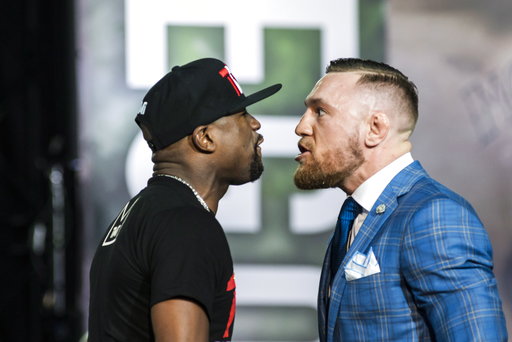 McGregor makes fun of Mayweather's tax problems 