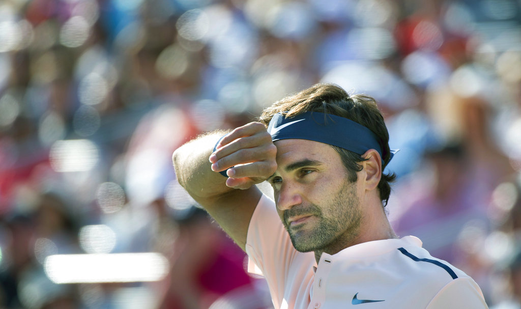 Federer out of Cincinnati with bad back; Nadal to be No. 1