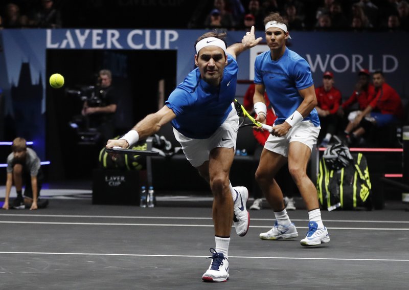 Nadal, Federer team up for first victorious doubles