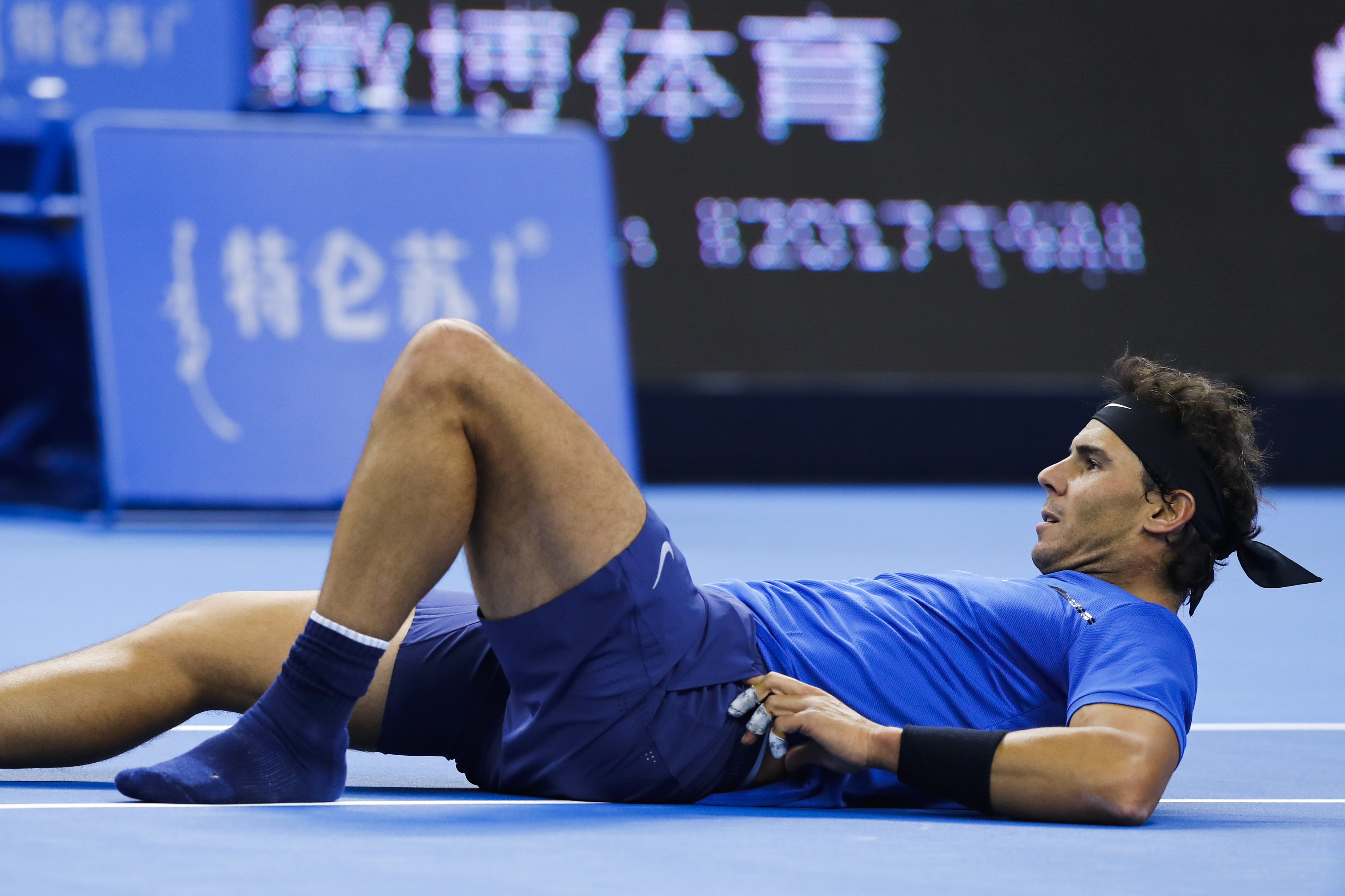 Nadal saves 2 match points, advances at China Open