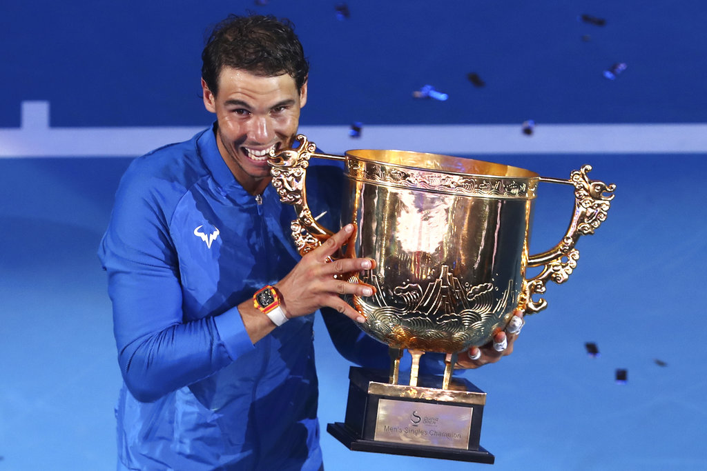 Nadal wins 6th title of year in Beijing; Garcia beats Halep