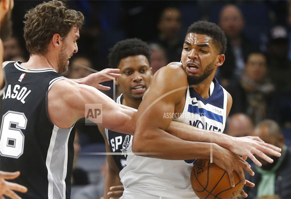 Towns, Wolves stop 12-game slide with win over Spurs