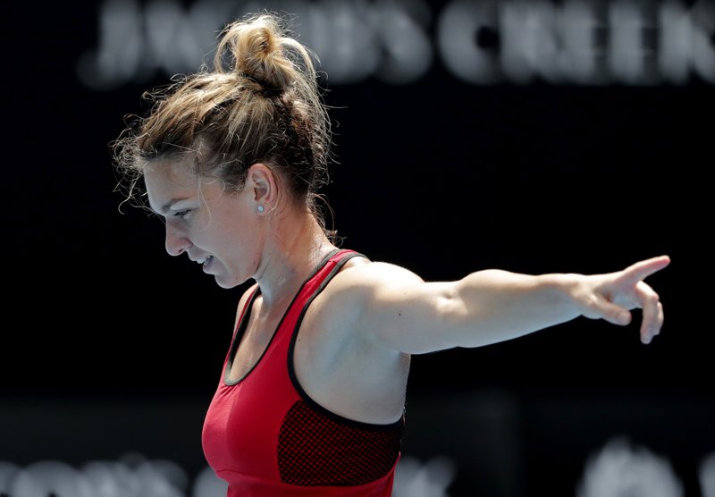  Long haul: No. 1 Halep fends off Davis in 3:45 marathon