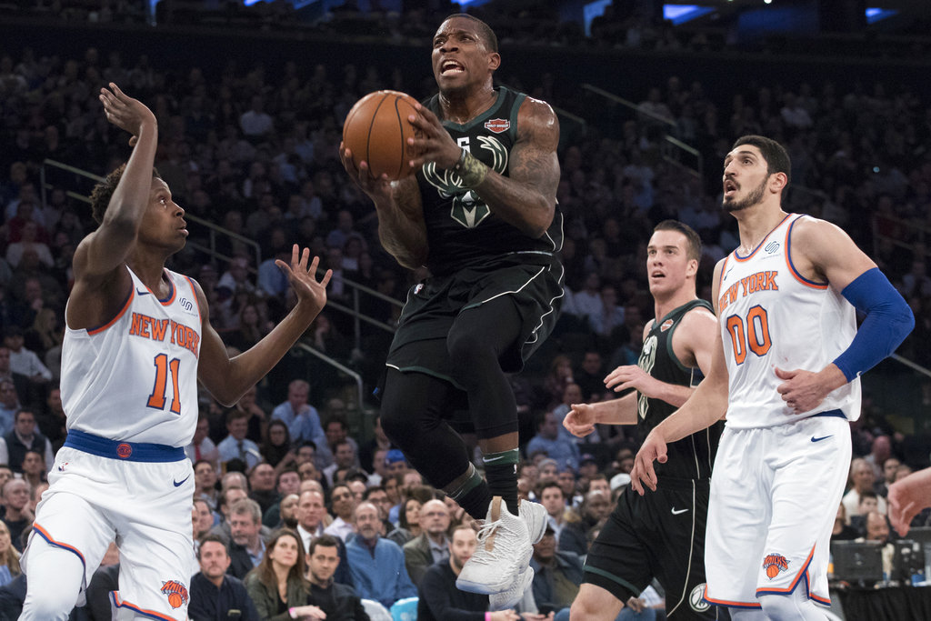 Giannis dunks over Knicks, who lose Porzingis to torn ACL ...