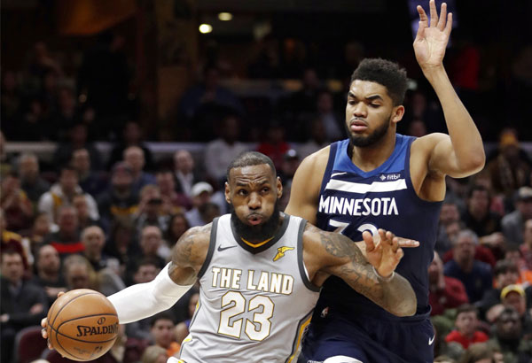 LeBron's last-second shot gives Cavs OT win over Wolves