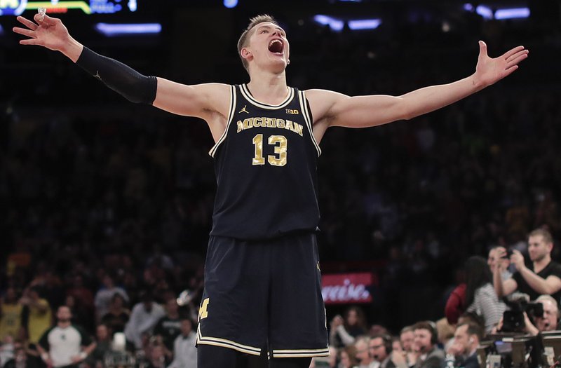 Michigan ends top-seeded Spartansâ 13-game winning streak