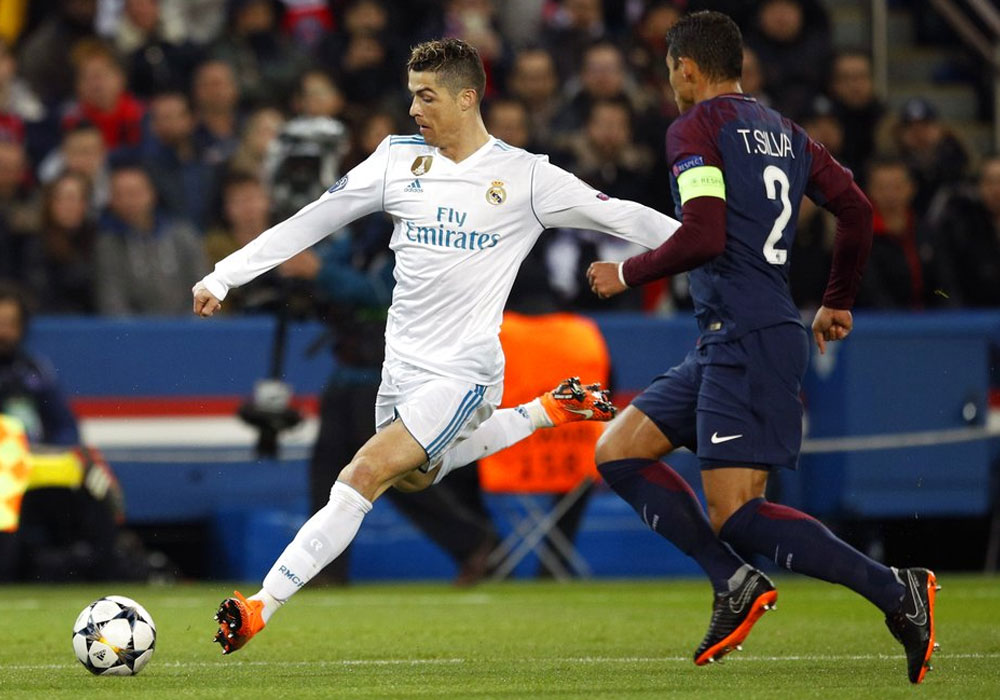 Real Madrid beats PSG 2-1 to reach Champions League quarters
