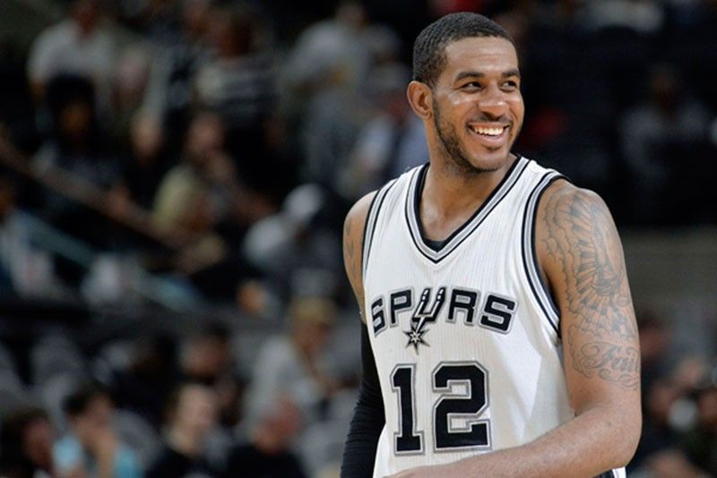 Aldridge powers Spurs to vital win over Magic