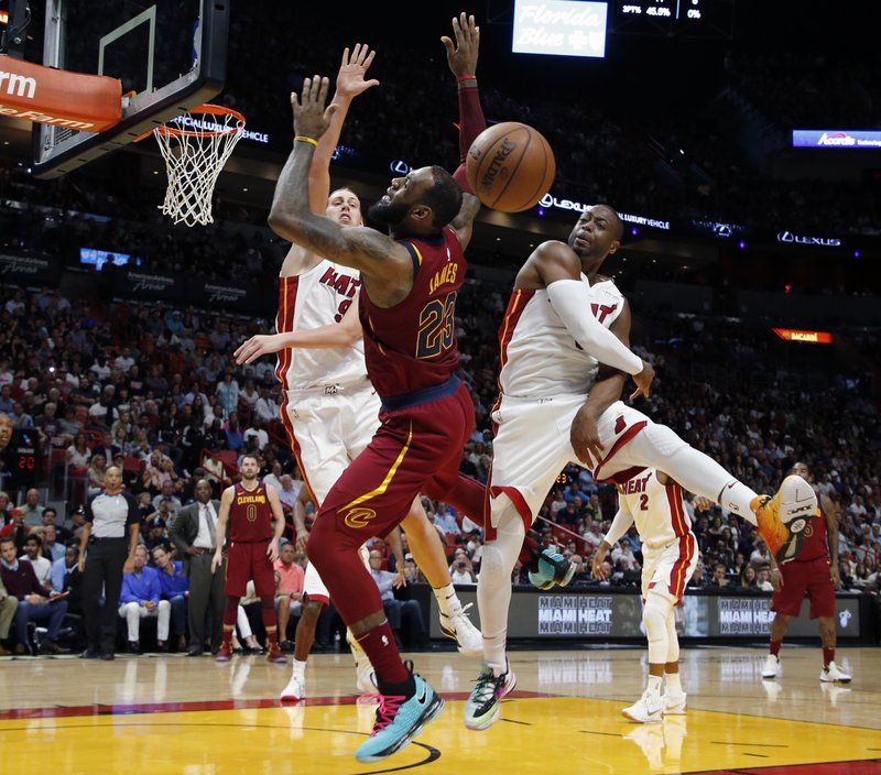 Clamping down: Wade, Heat stymie Cavaliers, 98-79