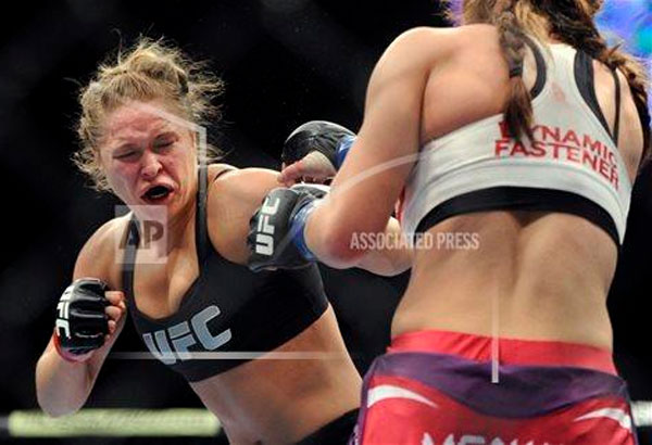 Ronda Rousey will fight former boxer Holly Holm on Jan. 2