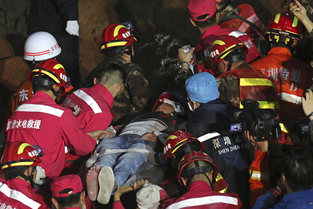 Mine collapse in China traps 18 workers; 11 rescued