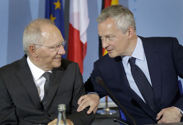 Germany, France pledge new efforts to strengthen eurozone
