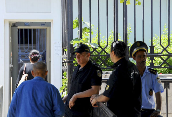 Tunisian trial opens over beach attack on British tourists