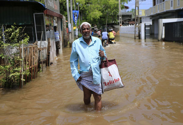 Sri Lanka finds more bodies as mudslide deaths reach 151