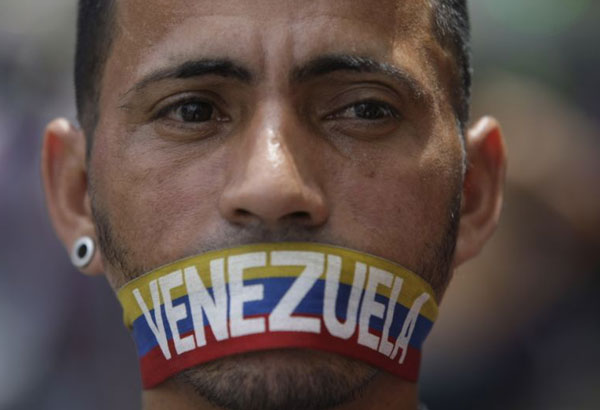 Nicolas Maduro Venezuela opposition lawmakers say police attacked them at demo