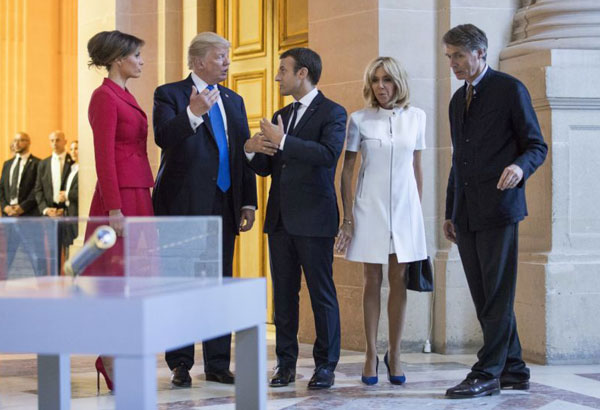 Trump caught on tape complimenting Macron's wife's body