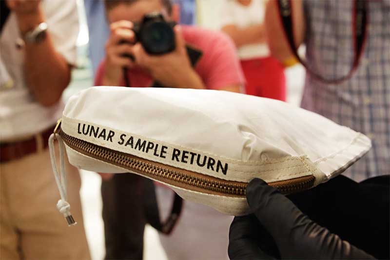 Apollo 11 bag laced with moon dust sells for $1.8 million