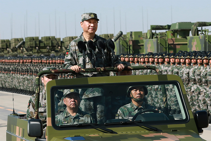 Chinese president oversees military parade in show of might