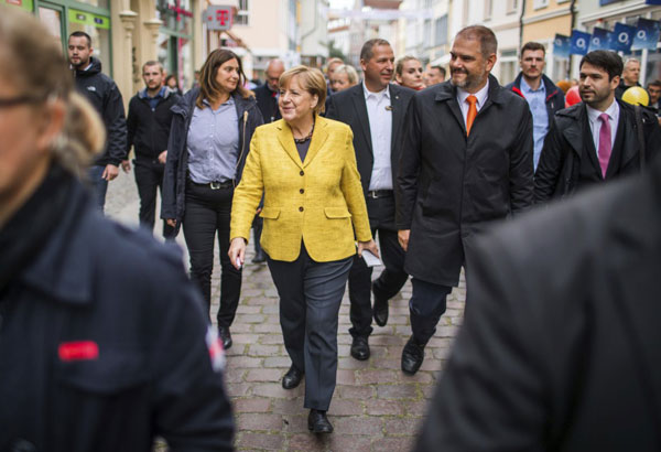 In final push, Merkel seeks to reach undecided German voters