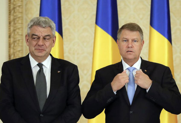 Romania's president criticizes government over economy