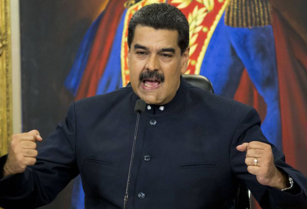 EU bans arms sales to Venezuela, takes aim at officials