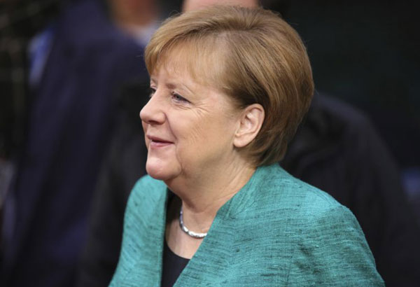 Germany's Social Democrats to talk with Merkel on new gov't
