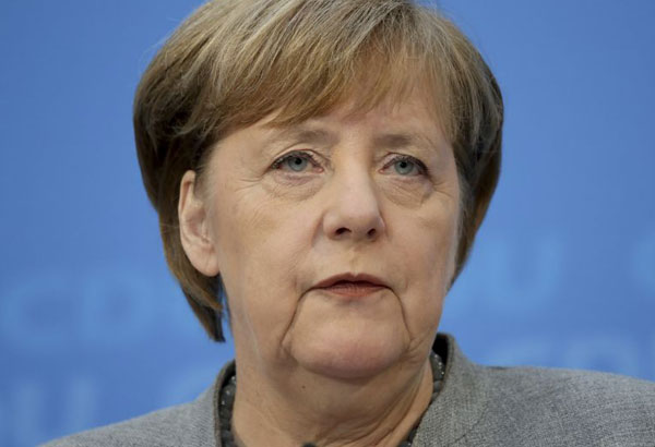 Merkel focused on grand coalition with Social Democrats