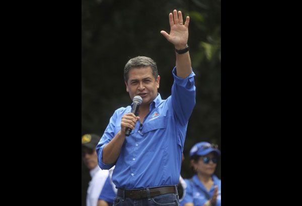 Honduras president declared election winner; unrest persists
