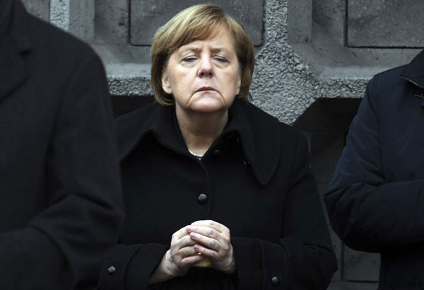 Merkel pledges to help survivors, learn from Berlin attack