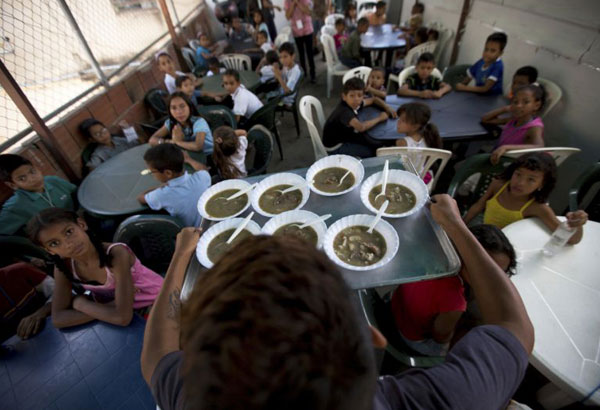 Venezuela's opposition reinvents itself with soup kitchens