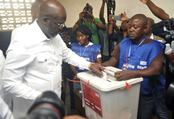 Ex-soccer star Weah elected Liberia president by wide margin