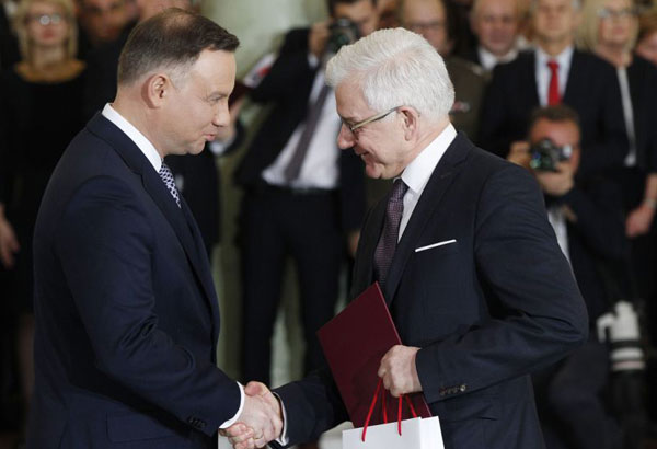 Polish PM reshuffles his Cabinet ahead of key EU visit