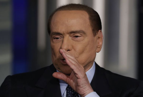 Italy ex-leader Berlusconi backs Deneuve on male courtship