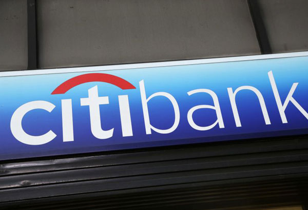 Citigroup reports $18.3 billion loss, caused by new tax law