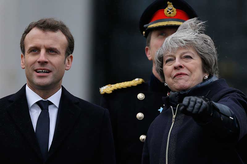 UK and French leaders reach border deal, disagree on Brexit