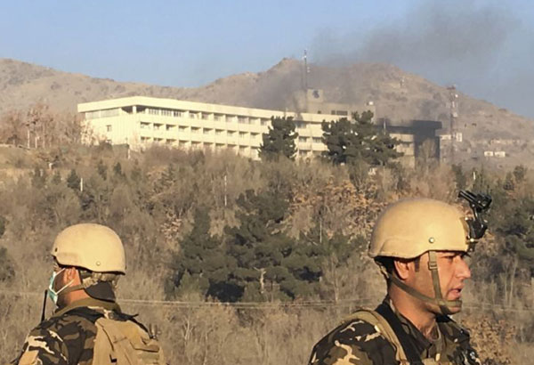 Afghanistan says Kabul hotel siege killed 18